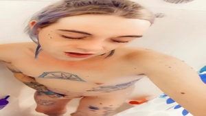 nice-looking beauty in nature's garb Taking A Shower
